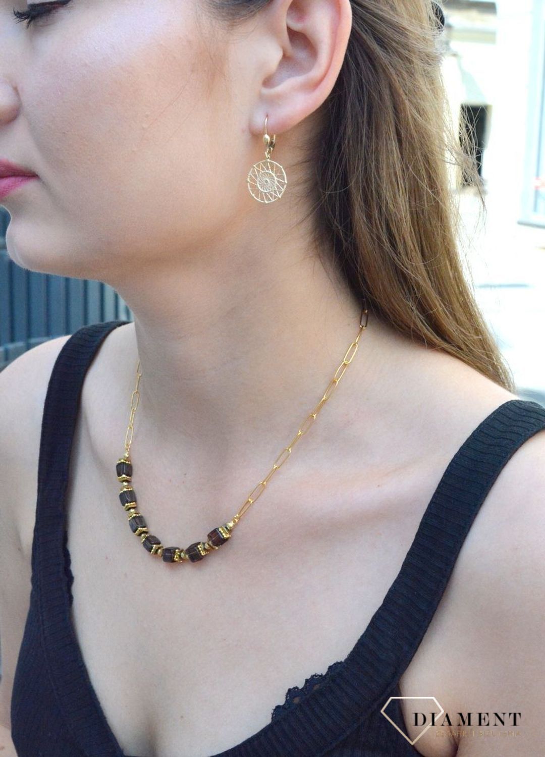 Złote kolczyki 333 ażurowe kółko KL 11048 333. Eleganckie, złote kolczyki 333 ażurowe kółka. Kolczyki zostały wykonane z żółtego złota próby 333 o wadze około 2,11 g oraz długości około 3 cm. Ich kształt jest uniwersalny..jpg